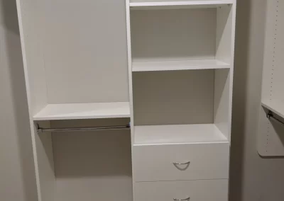 Custom Walk-in Closet Installation With Adjustable Shelves and Three Drawers