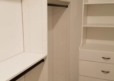 Corner View Custom Closet With Extra Hanging Space