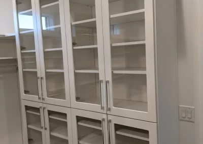 Custom Closet Shelves with Glass Doors