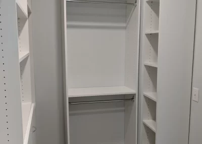 White Custom Closet with Chrome Rods 2