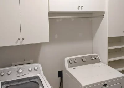 Custom Laundry Room Cabinets with Hanging Space