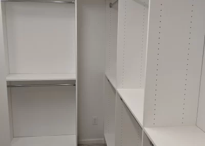 Custom Closet With Massive Hanging Space And Chrome Rods